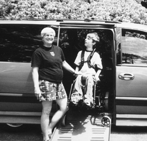 Photo of Polly and Crhis Medlicott and their van.