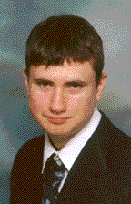 This is a senior photo of the same little boy, six years older now.